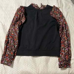 black sweater blouse with floral sleeves